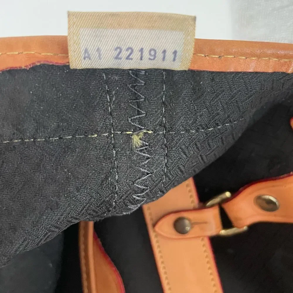 Dooney & Bourke Cabriolet Canvas and Leather Bucket Bag Vintage